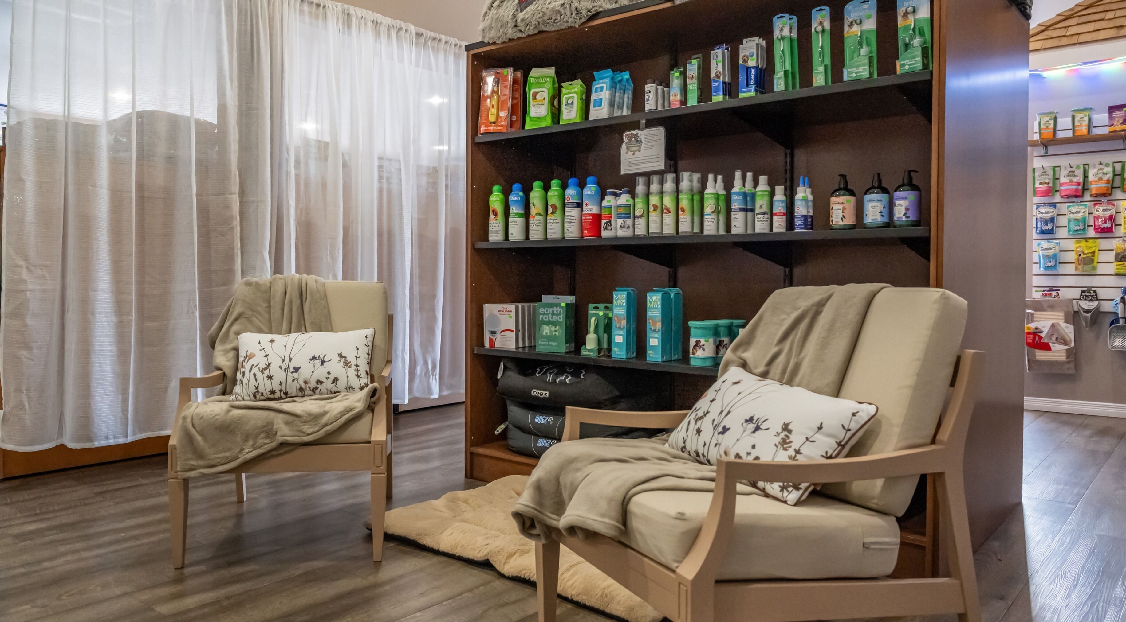 Relaxing seating area at Skinkle's Pet Supplies & More in Stirling, Ontario, CA, showcasing pet products.