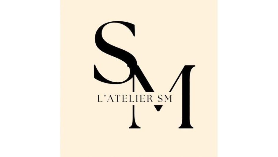 Logo élégant de L’atelier SM🤎 situé à Barentin, Normandie, FR.