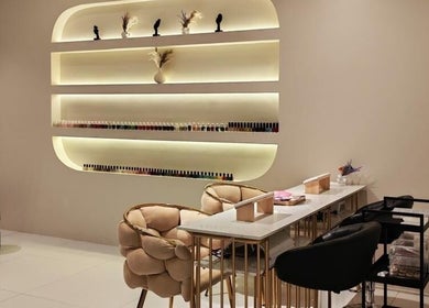Chic nail service area at Beauty Look Ladies Care Center in Sharjah, AE, with elegant design and seating.