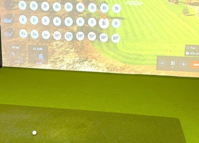 Golf simulator at Adam Bland Golf, Flagstaff Hill, South Australia, AU, displaying virtual course and club selection.