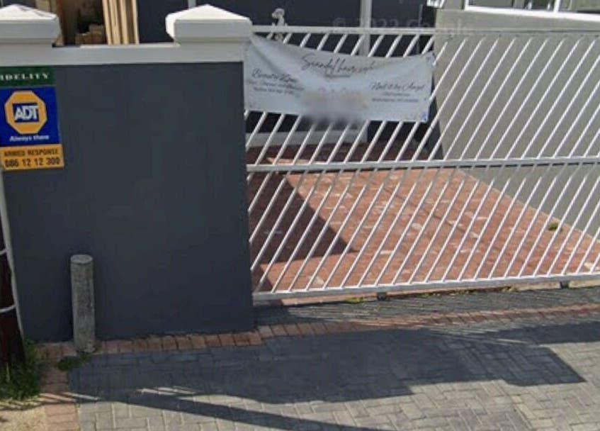 Secure entrance gate of Nails by Jordan, Cape Town, Western Cape, ZA.