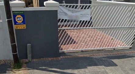 Secure entrance gate of Nails by Jordan, Cape Town, Western Cape, ZA.