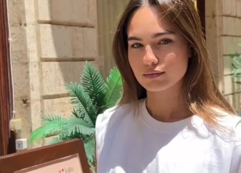 A serene entrance at GLAM x kalm, featuring lush plants in Beirut, LB.