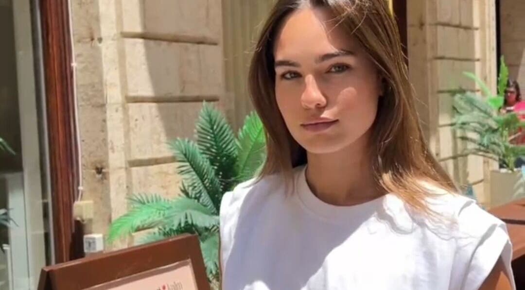 A serene entrance at GLAM x kalm, featuring lush plants in Beirut, LB.