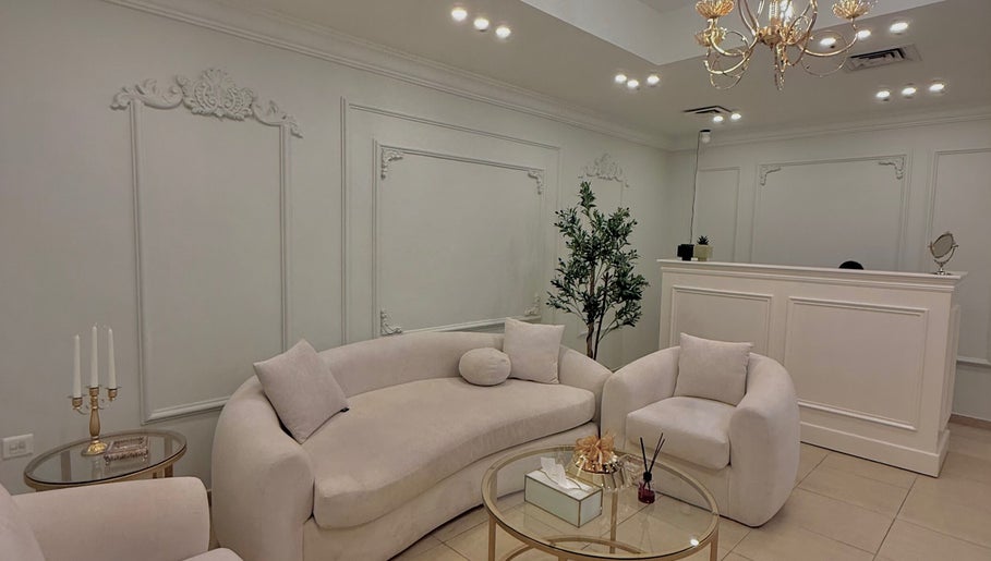 Chic lounge area at By Lana Lashes, Amman, Amman Governorate, JO with plush seating and ornate decor.