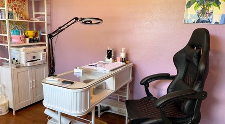 Nail station at Nail Love by Megan, North Port, Florida, US. Cozy setup with tools and chair for a relaxing experience.