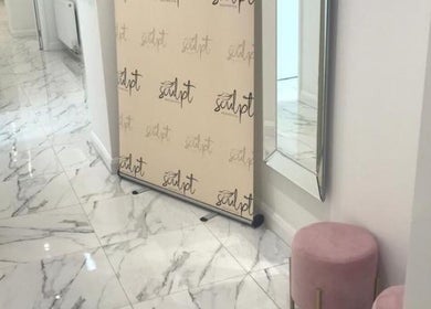 Simply Glamorous Aesthetics hallway with polished marble floors in Paisley, Scotland, GB.