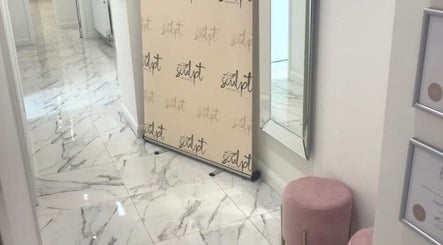 Simply Glamorous Aesthetics hallway with polished marble floors in Paisley, Scotland, GB.