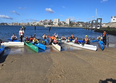 Group of paddlers with kayaks at Nelo & Surfing Porto Paddling Center, Vila Nova De Gaia, Porto, PT.