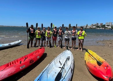 Group prepares for kayaking at Nelo & Surfing Porto Paddling Center, Vila Nova De Gaia, Porto, PT.