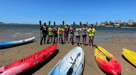 Group prepares for kayaking at Nelo & Surfing Porto Paddling Center, Vila Nova De Gaia, Porto, PT.