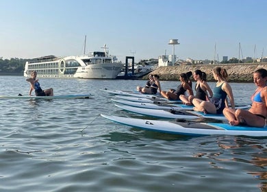 Yoga paddleboards at Nelo & Surfing Porto Paddling Center, Vila Nova De Gaia, Porto, PT, enhancing relaxation.