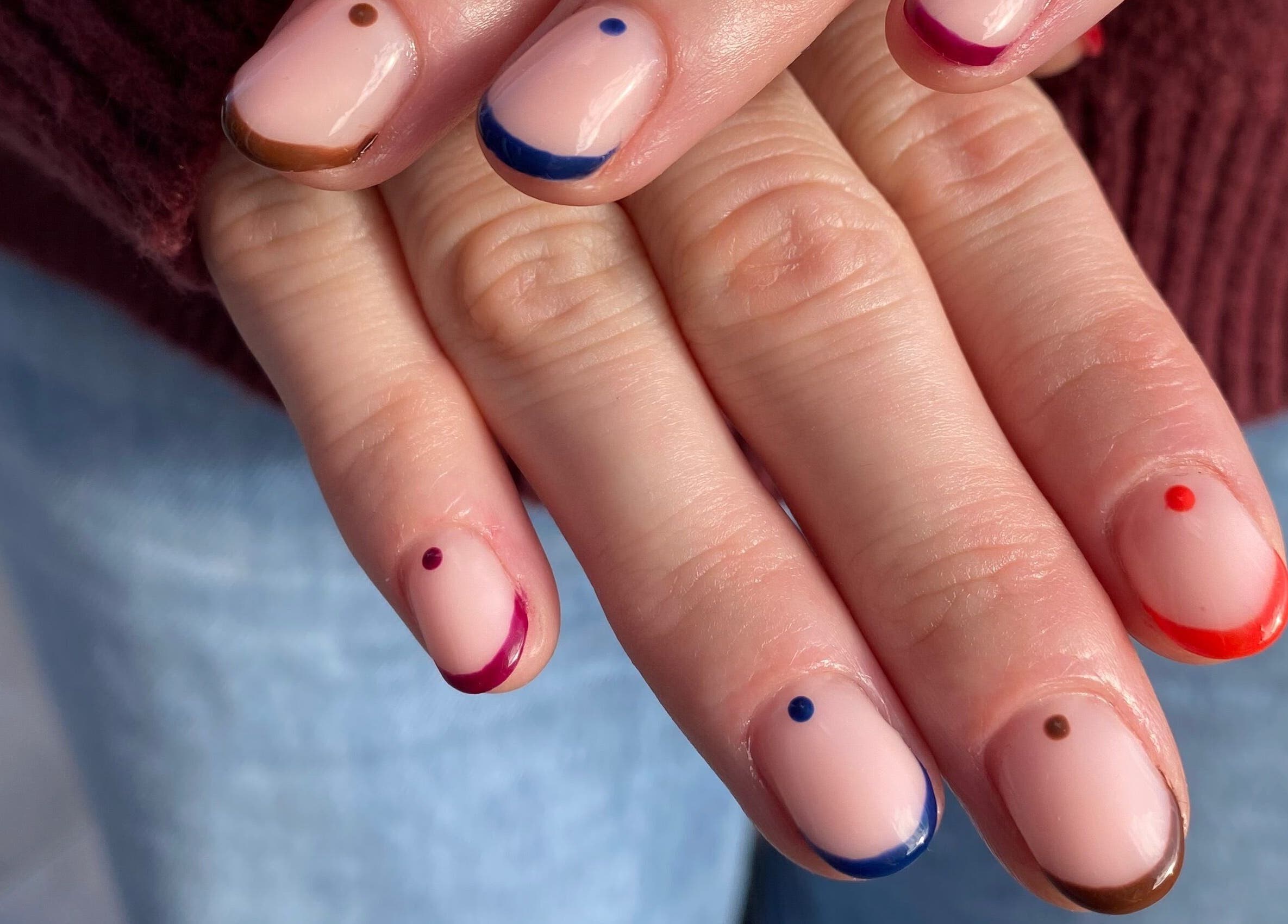 Stylish multicolored nail art at Bloom & Noble Nails in Swindon, England, GB.