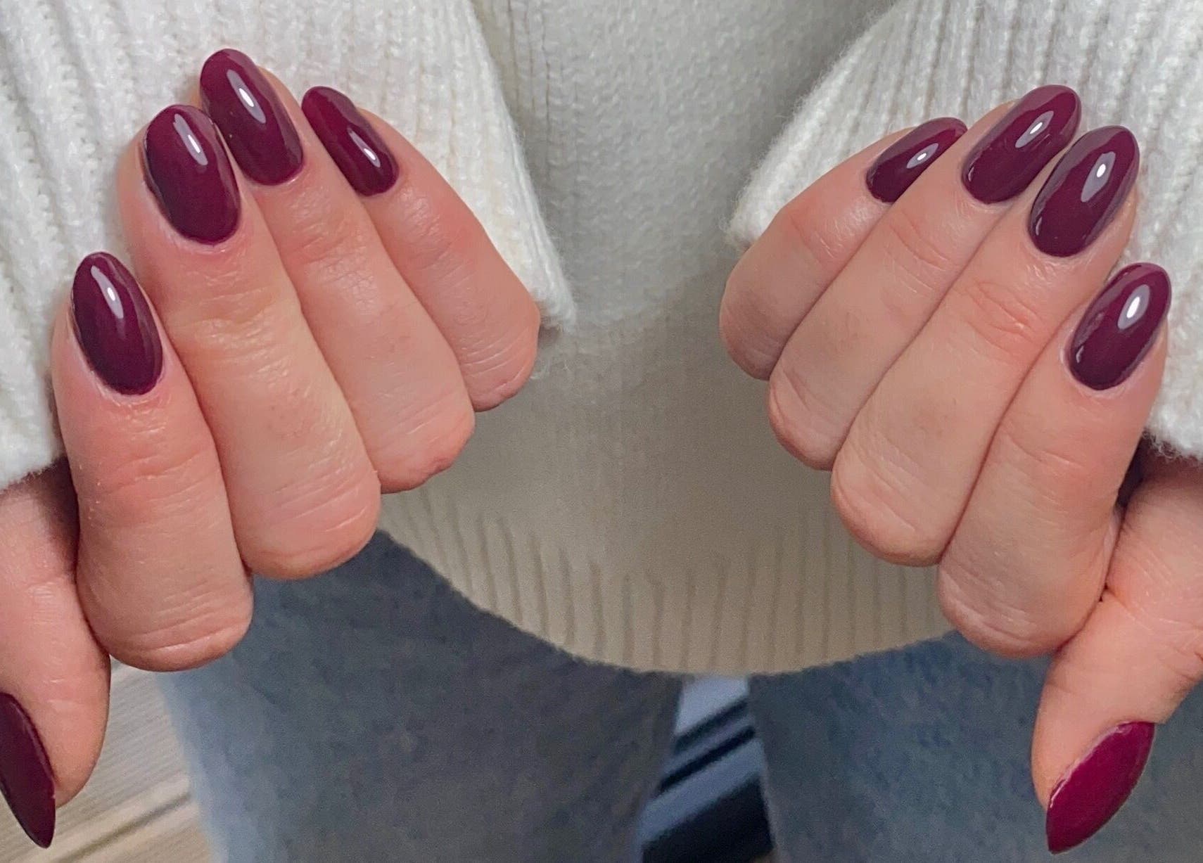 Elegant burgundy nails manicure at Bloom & Noble Nails, Swindon, England, GB showcasing glossy finish.