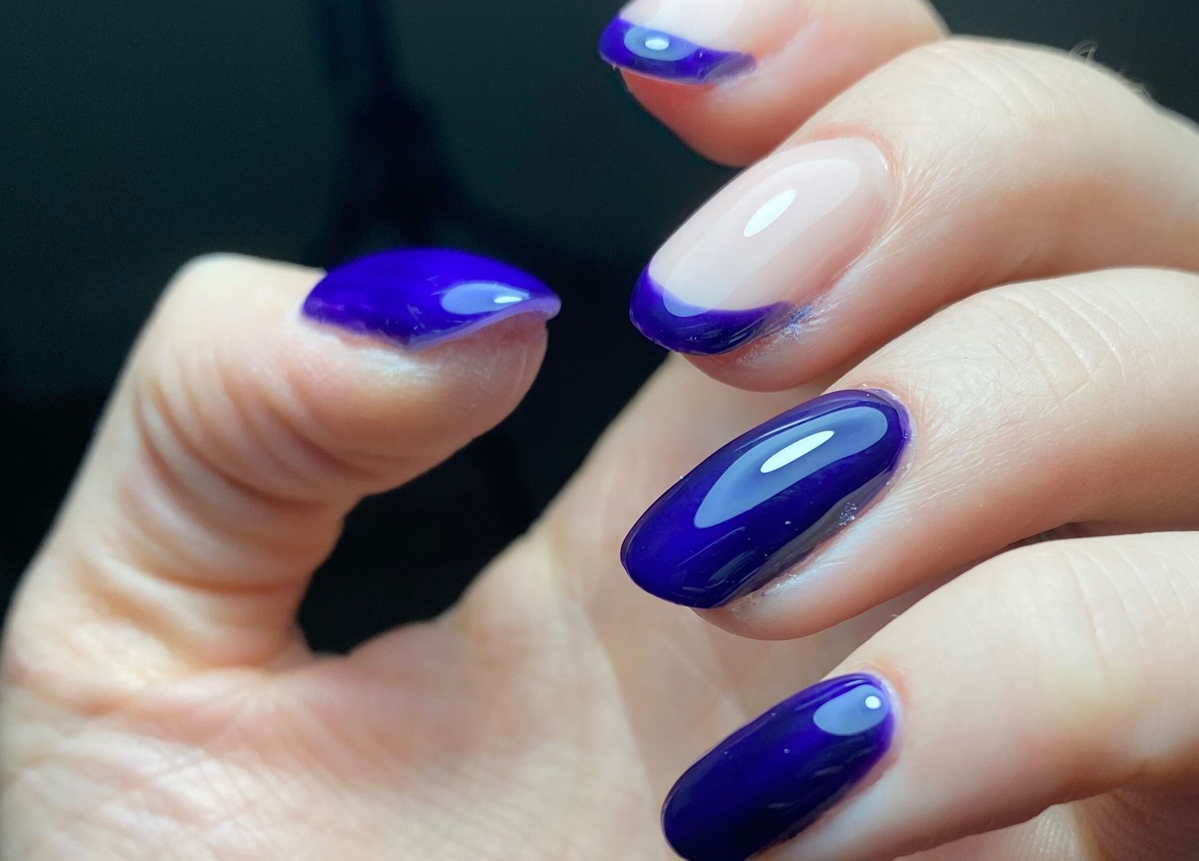 Vibrant purple manicure at Bloom & Noble Nails in Swindon, England, GB showcasing glossy nail art.