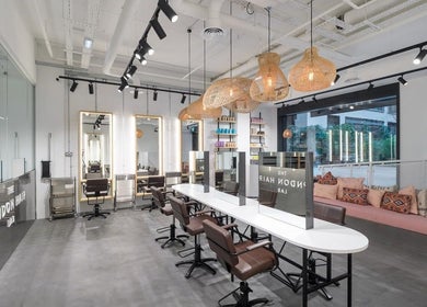 Vixen & Blush Hair Extensions salon in London, England, GB with modern seating and stylish decor.