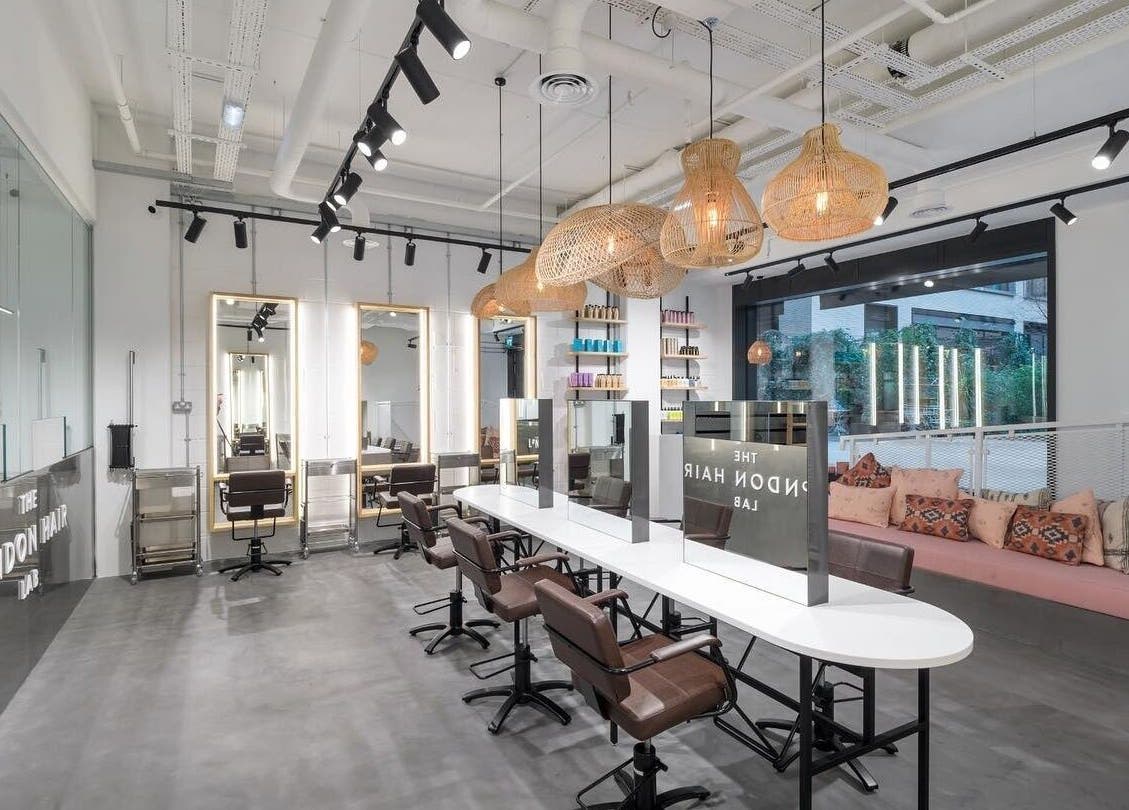 Vixen & Blush Hair Extensions salon in London, England, GB with modern seating and stylish decor.