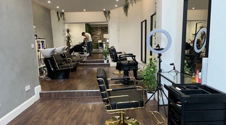Chic interior of Adriana Guzman Hairdresser in Dublin, County Dublin, IE, featuring elegant styling chairs and decor.
