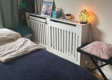 Cozy massage room at Everwell Massage Therapies - Lynnea in Brynsadler, Wales, GB, featuring a serene setup.