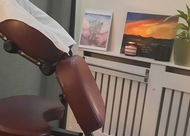 Cozy massage chair setup with calming decor at Everwell Massage Therapies - Lynnea, Brynsadler, Wales, GB.