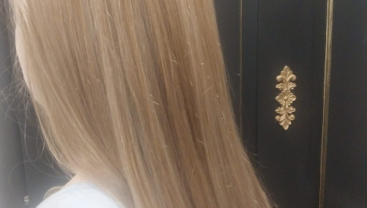 Lustrous blonde hair styled at Hair on Langdon Craigieburn, Victoria, AU, showcasing a sleek finish.