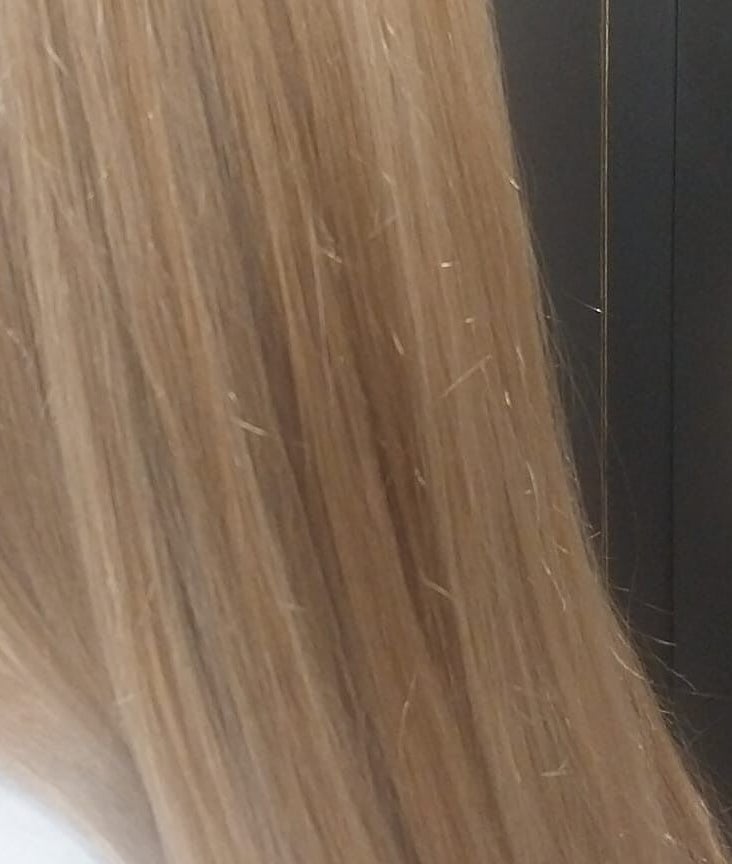 Lustrous blonde hair styled at Hair on Langdon Craigieburn, Victoria, AU, showcasing a sleek finish.