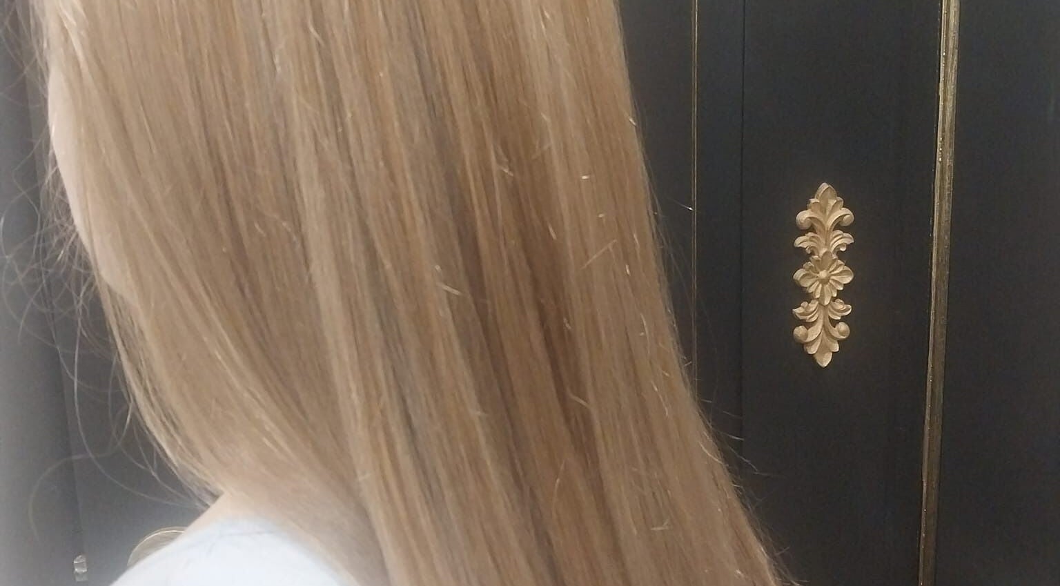 Lustrous blonde hair styled at Hair on Langdon Craigieburn, Victoria, AU, showcasing a sleek finish.