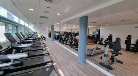 Spacious gym at Adam Emblen - Personal Training in Manchester, England, GB, featuring modern equipment.