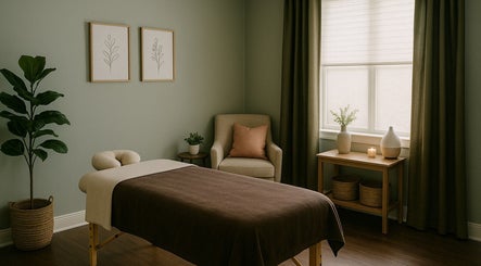 Relaxing spa room at Adree Thompson Massage in Redmond, Oregon, US with massage table and calming decor.