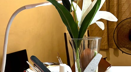 Elegant nail tools and flower arrangement at Miss Bliss Nails, Calauan, Calabarzon, PH.