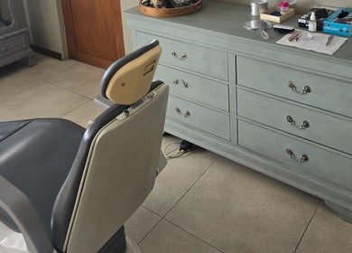 Treatment chair and storage at Dr Maritza Nienaber, Middelburg, Mpumalanga, ZA. Perfect for wellness sessions.