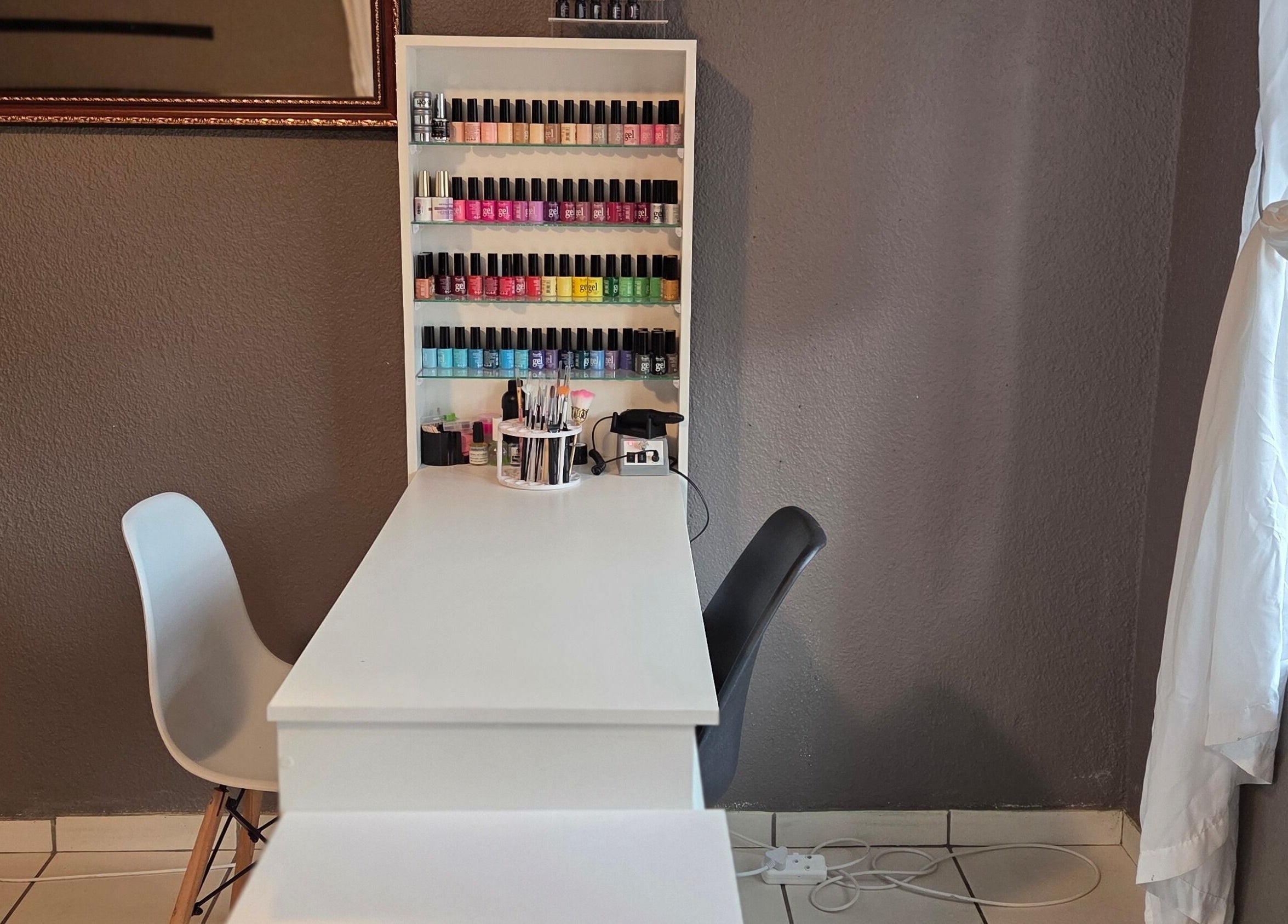 Elegant nail polish display at Pretty Claws by Melisha, Rustenburg, North West, ZA offering a serene beauty experience.