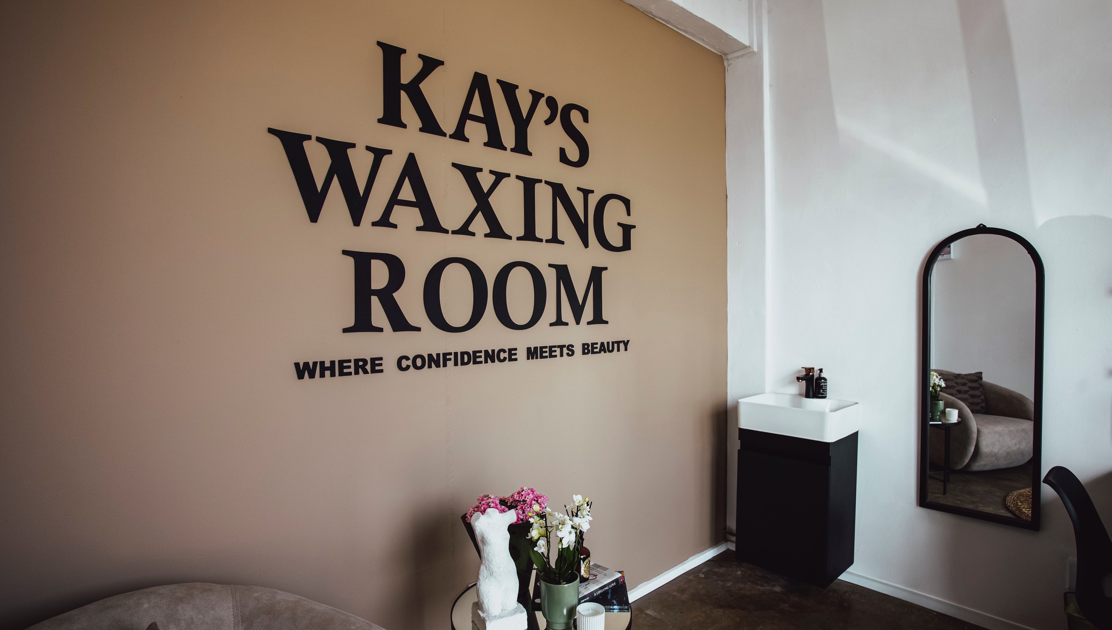 Interior of Kayswaxingroom in Umhlanga, Kwazulu-natal, ZA, featuring stylish decor and a welcoming ambiance.