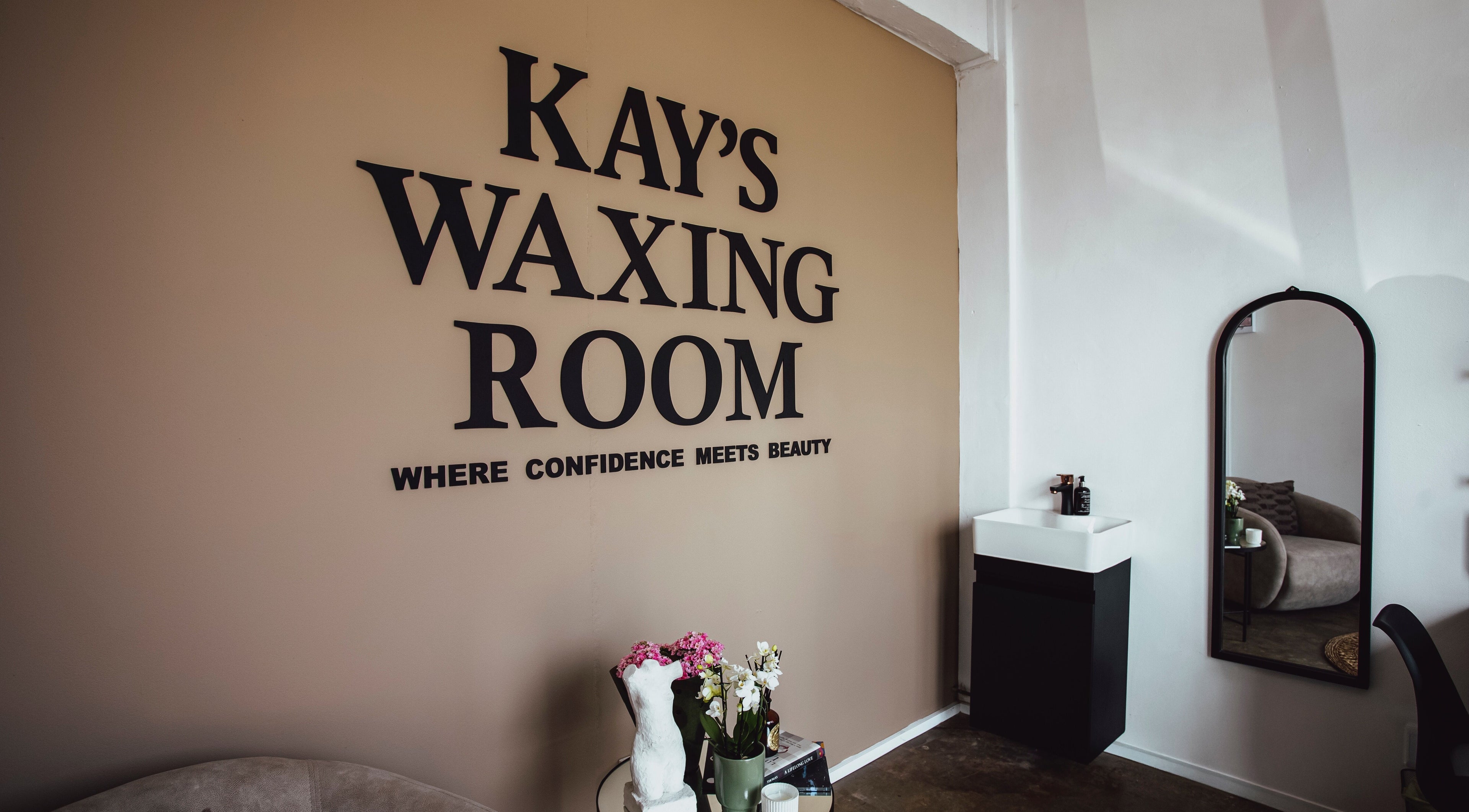 Interior of Kayswaxingroom in Umhlanga, Kwazulu-natal, ZA, featuring stylish decor and a welcoming ambiance.
