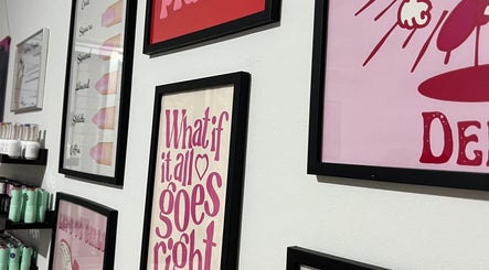 Framed wall art at Nails Before Males 💅 in Nicosia, Lefkosia, CY showcasing vibrant and motivational prints.