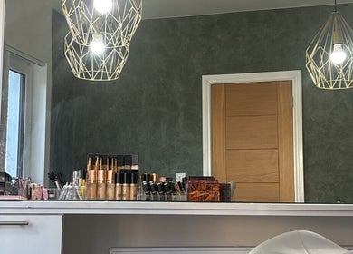 Stylish makeup station at SD Makeup Artistry in Castlereagh, Northern Ireland, GB with elegant lighting.