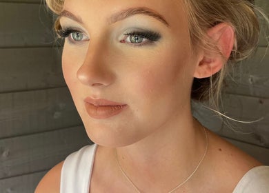 Natural makeup look at Ivy Bloom, Coggeshall, England, GB, highlighting flawless skin and soft contouring.