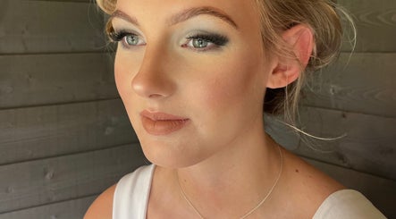Natural makeup look at Ivy Bloom, Coggeshall, England, GB, highlighting flawless skin and soft contouring.