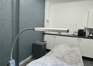 Elegant treatment room at House of Gaia, Aberbargoed, Wales, GB featuring a cozy treatment bed and ambient lighting.
