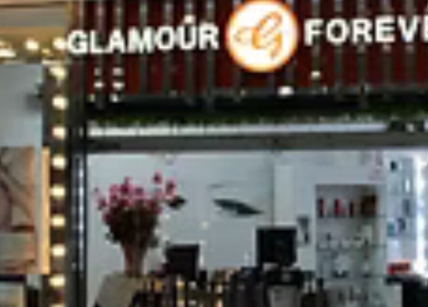 Elegant entrance of Glamour Forever Preston, adorned with beauty displays in Preston, England, GB.