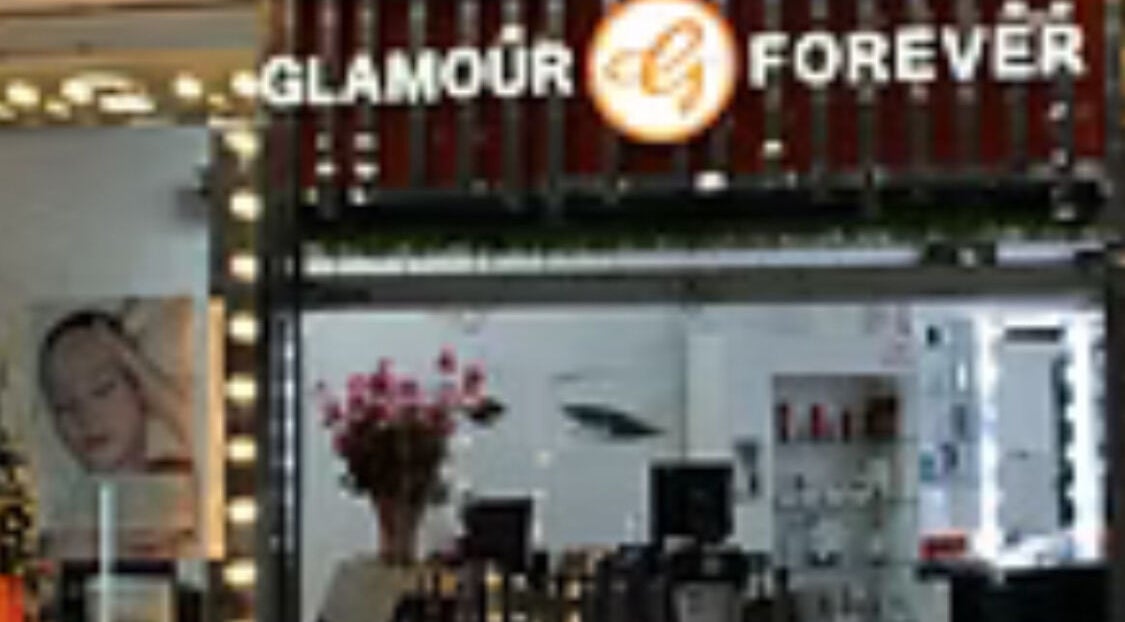 Elegant entrance of Glamour Forever Preston, adorned with beauty displays in Preston, England, GB.
