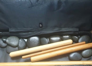Massage stones and bamboo sticks at Trudy Wilson Mobile Massage and Holistic Therapies, Larbert, Scotland, GB.