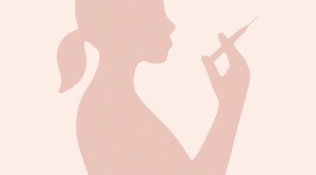 Silhouette of a woman with syringe at Keli Chapman Aesthetics, Liverpool, England, GB