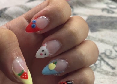 Colorful, artistic nail art with fruit designs at painted.by.samii, Wesley Chapel, Florida, US.