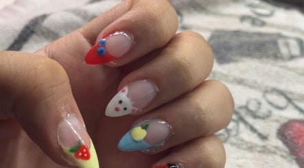 Colorful, artistic nail art with fruit designs at painted.by.samii, Wesley Chapel, Florida, US.