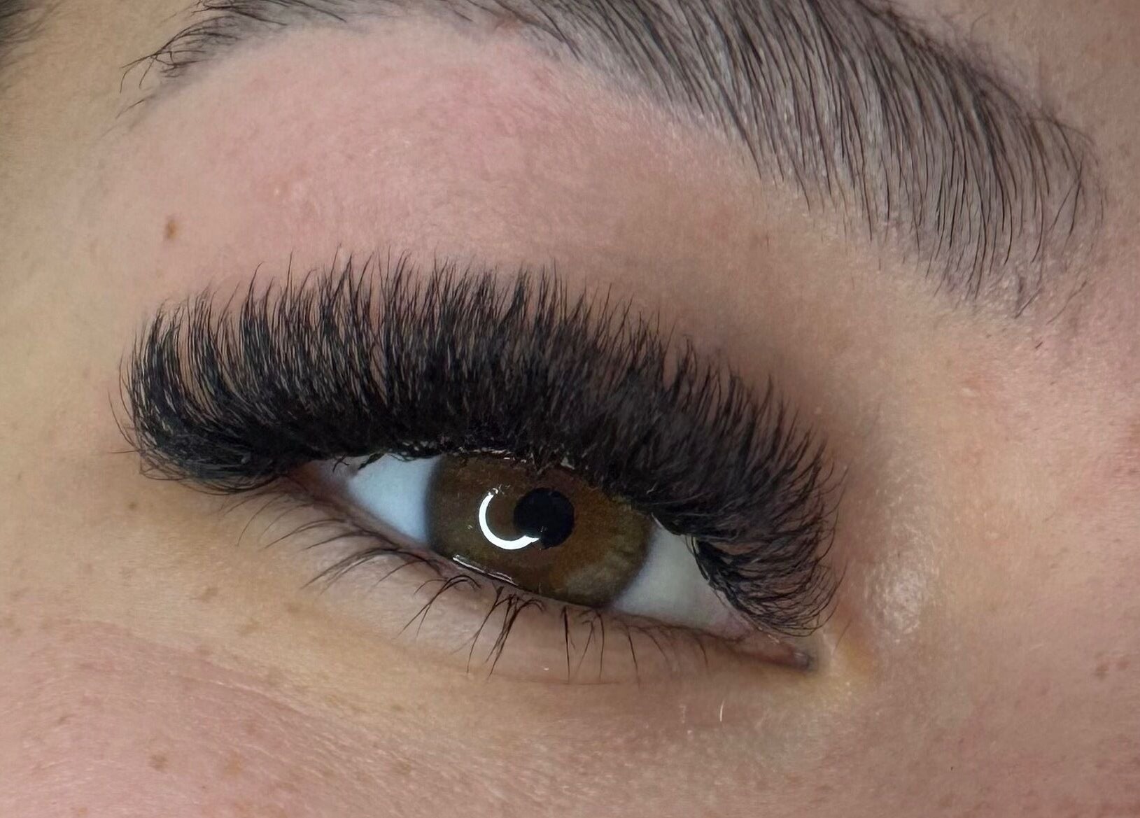 Close-up of expertly applied eyelash extensions at Lashes By Juli, Rockdale, New South Wales, AU.