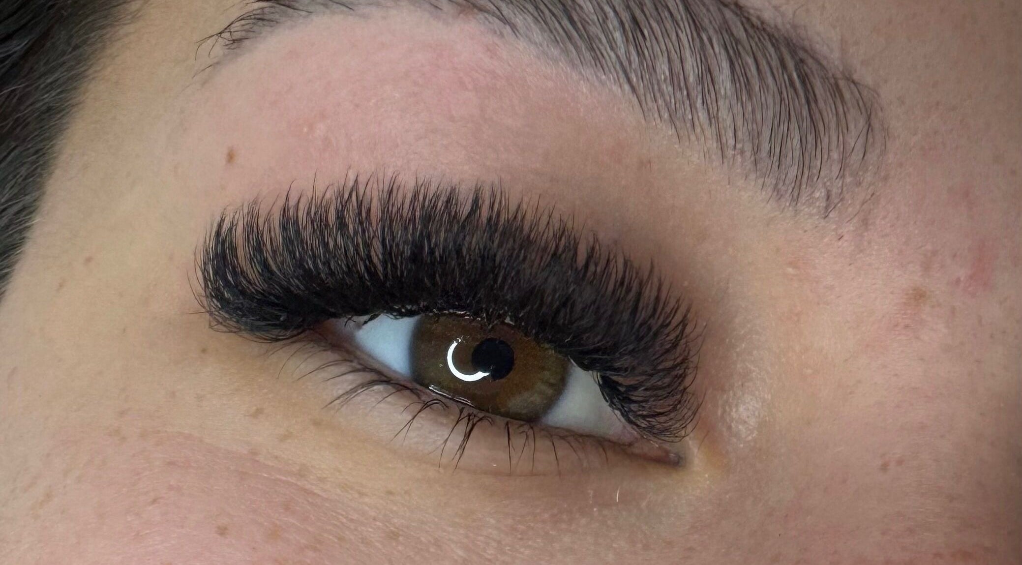 Close-up of expertly applied eyelash extensions at Lashes By Juli, Rockdale, New South Wales, AU.