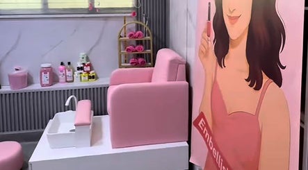 Stylish pink manicure station at Embelli Shed By Aya in Aley, Mount Lebanon Governorate, LB offers luxury nail care.