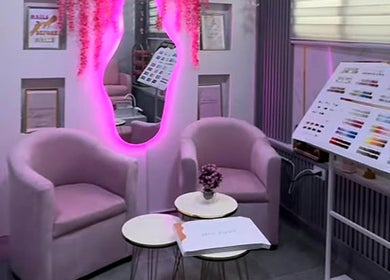 Cozy pink seating area in Embelli Shed By Aya, Aley, Mount Lebanon Governorate, LB with modern wall decor.