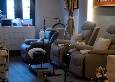 Luxurious lounge chairs at Reyouth Skin Beauty Care, Singapore, Singapore, SG, offering premium relaxation.
